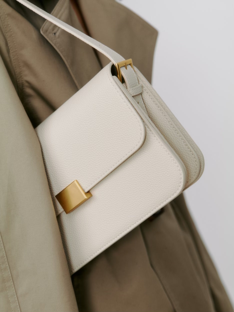 Cream handbag sale